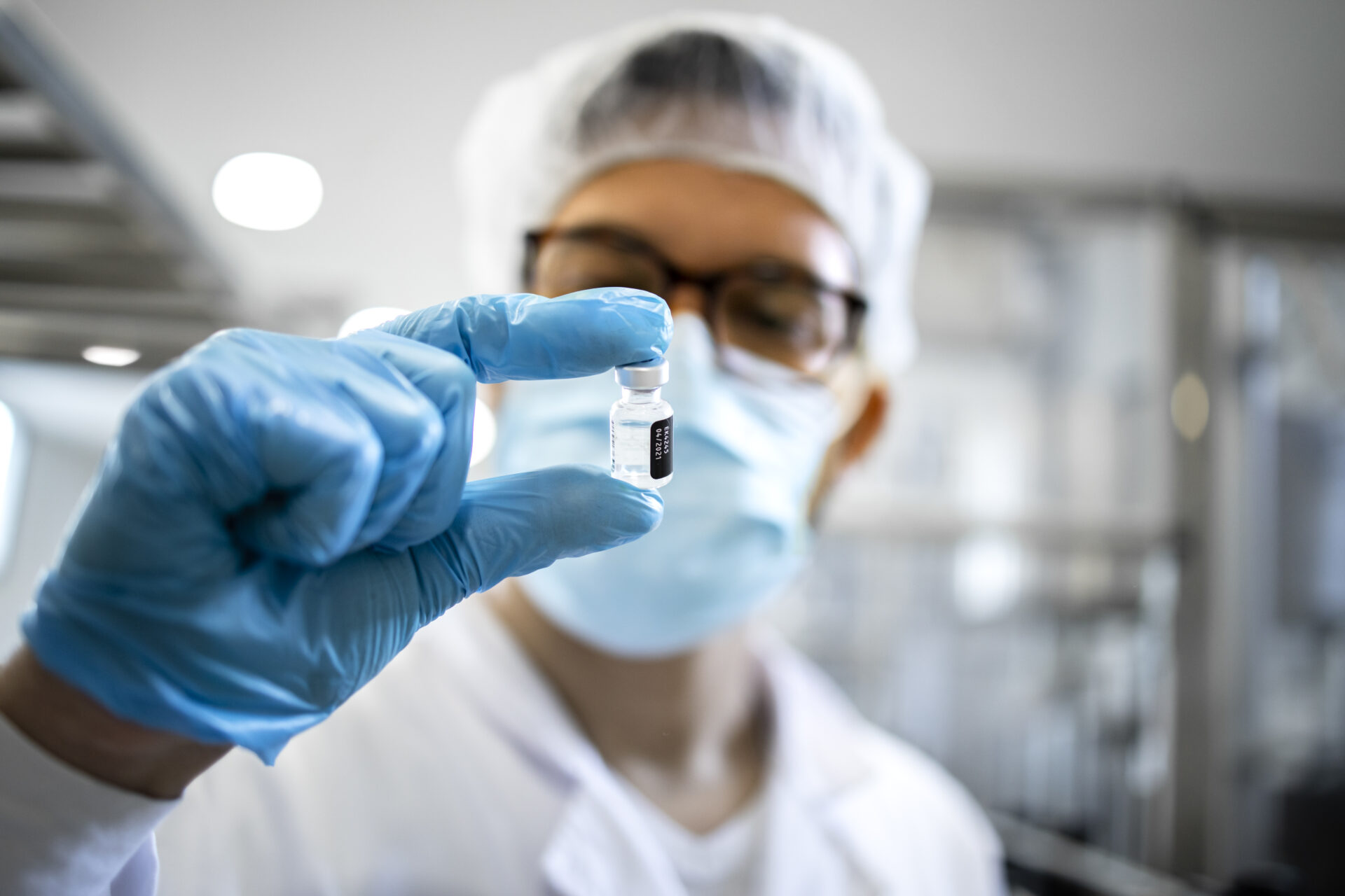 Pharmacist preparing an investigational medicinal product at Nucleus Network’s London clinical trial facility
